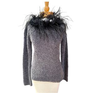Radzoli stunning sweater wool bend with Ostrich feathers around the neckline'. M